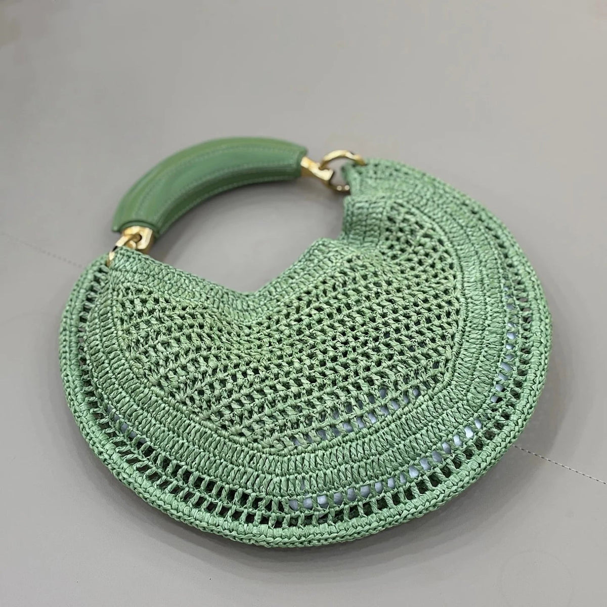 Bolso tejido de media luna Sabine