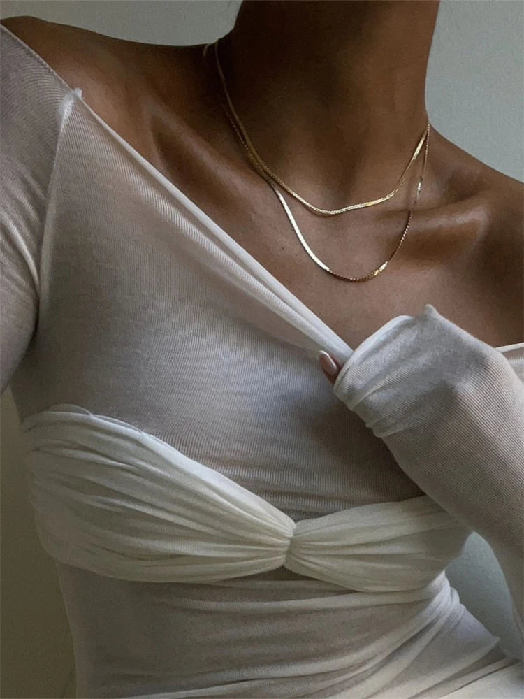 Top transparente de malla con hombros descubiertos Sara