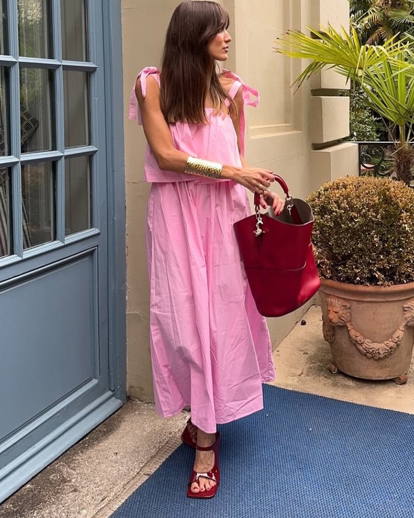 Vestido midi rosa con lazo y volantes Sophia