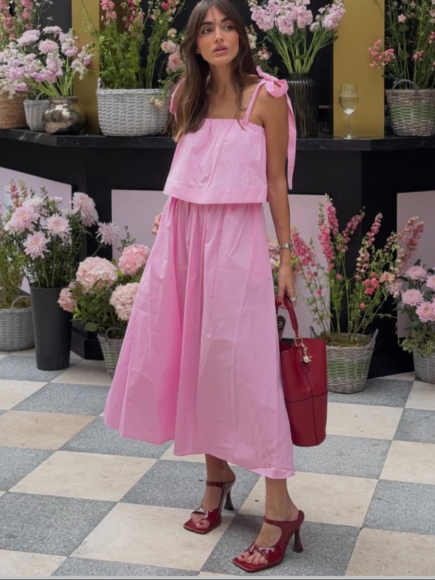 Vestido midi rosa con lazo y volantes Sophia