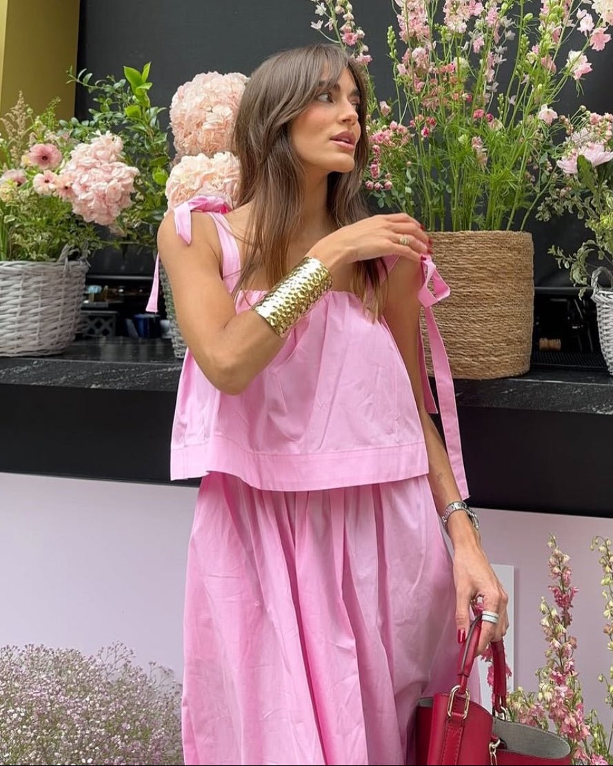 Vestido midi rosa con lazo y volantes Sophia