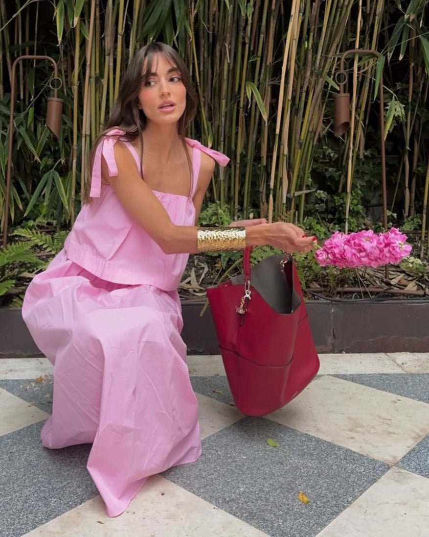 Vestido midi rosa con lazo y volantes Sophia