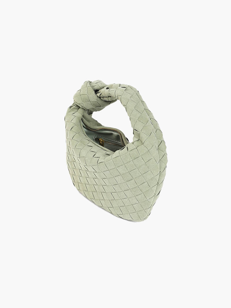 Mini bolso de mano de ante trenzado