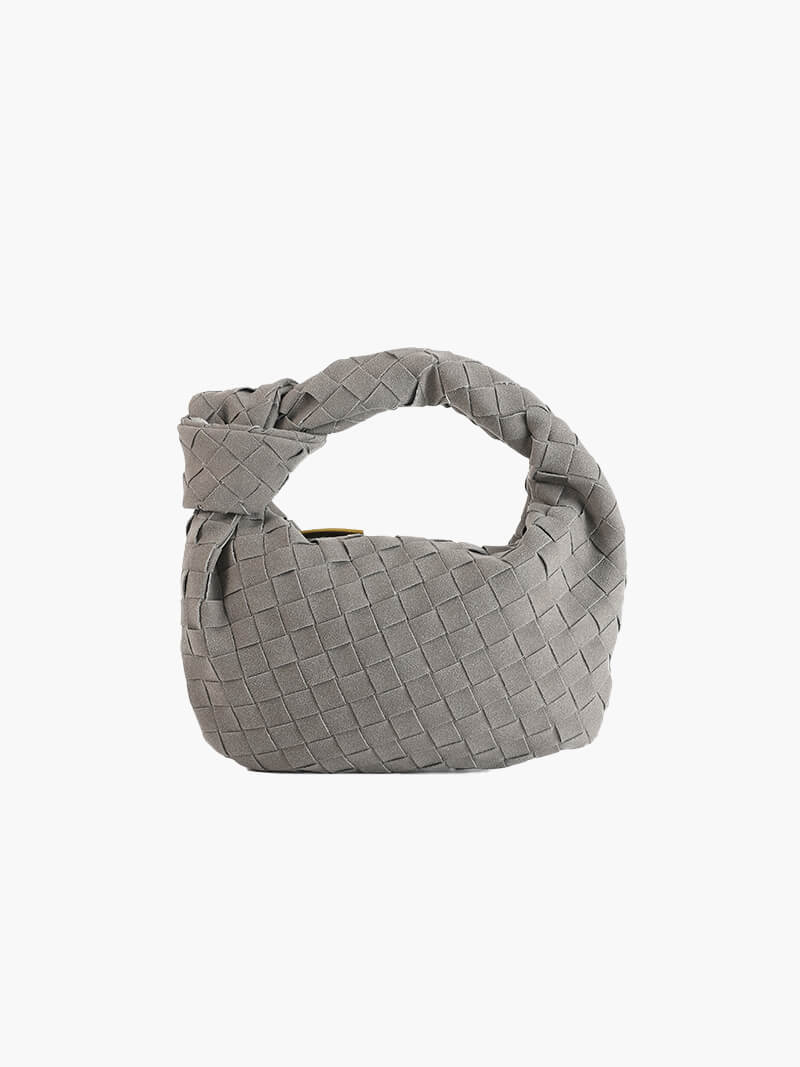 Mini bolso de mano de ante trenzado