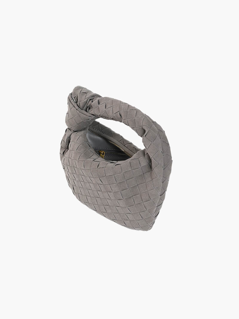 Mini bolso de mano de ante trenzado