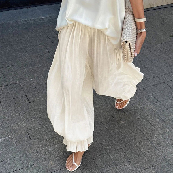 Pantalones acampanados transparentes Thea