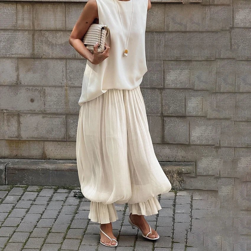 Pantalones acampanados transparentes Thea
