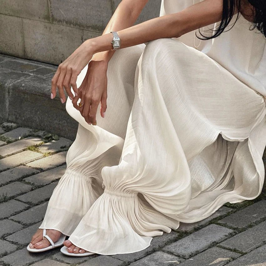 Pantalones acampanados transparentes Thea