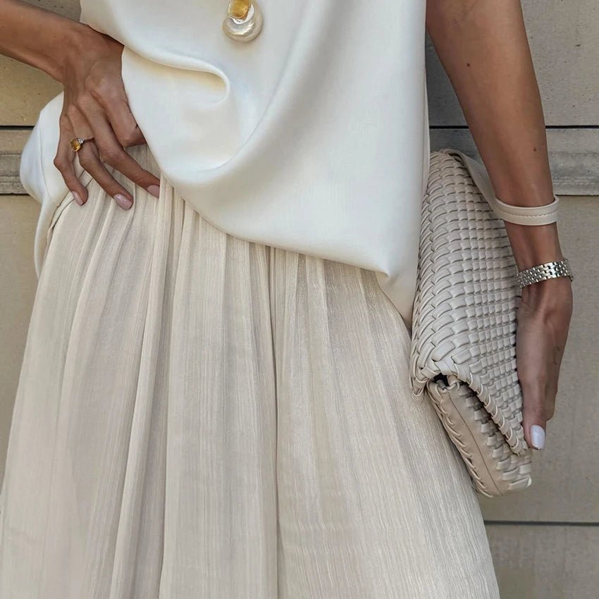 Pantalones acampanados transparentes Thea