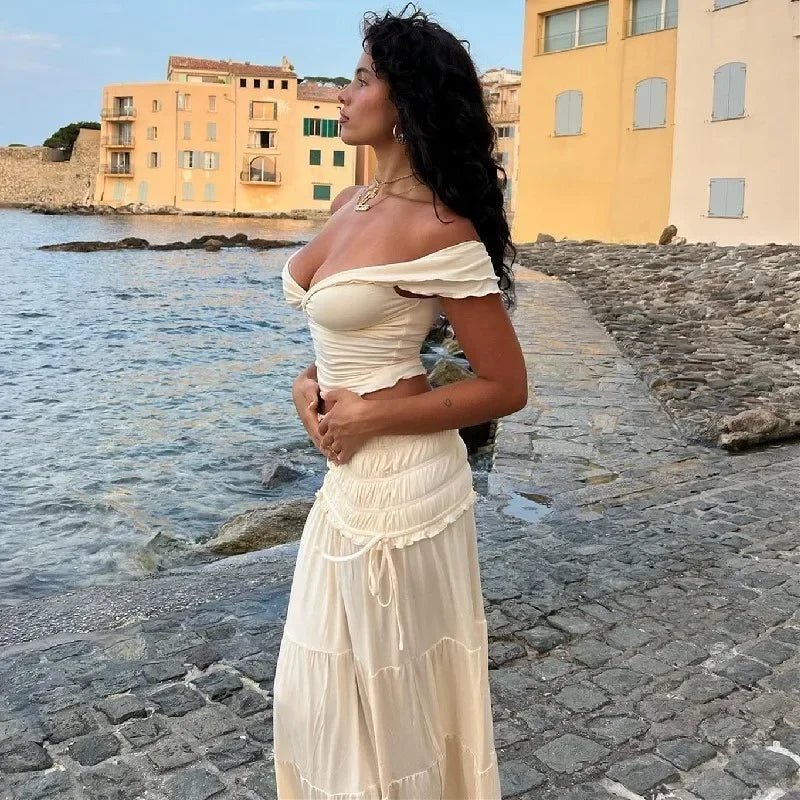 Conjunto Zendaya de top corto con volantes y falda larga