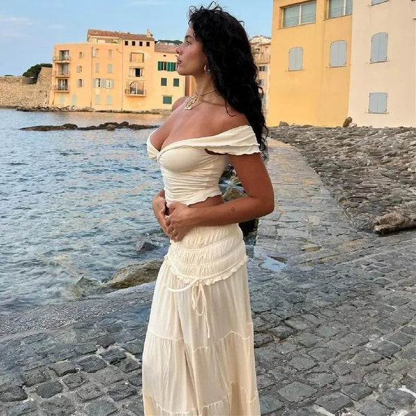 Conjunto Zendaya de top corto con volantes y falda larga