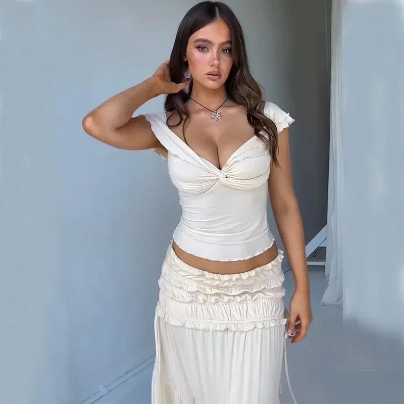 Conjunto Zendaya de top corto con volantes y falda larga