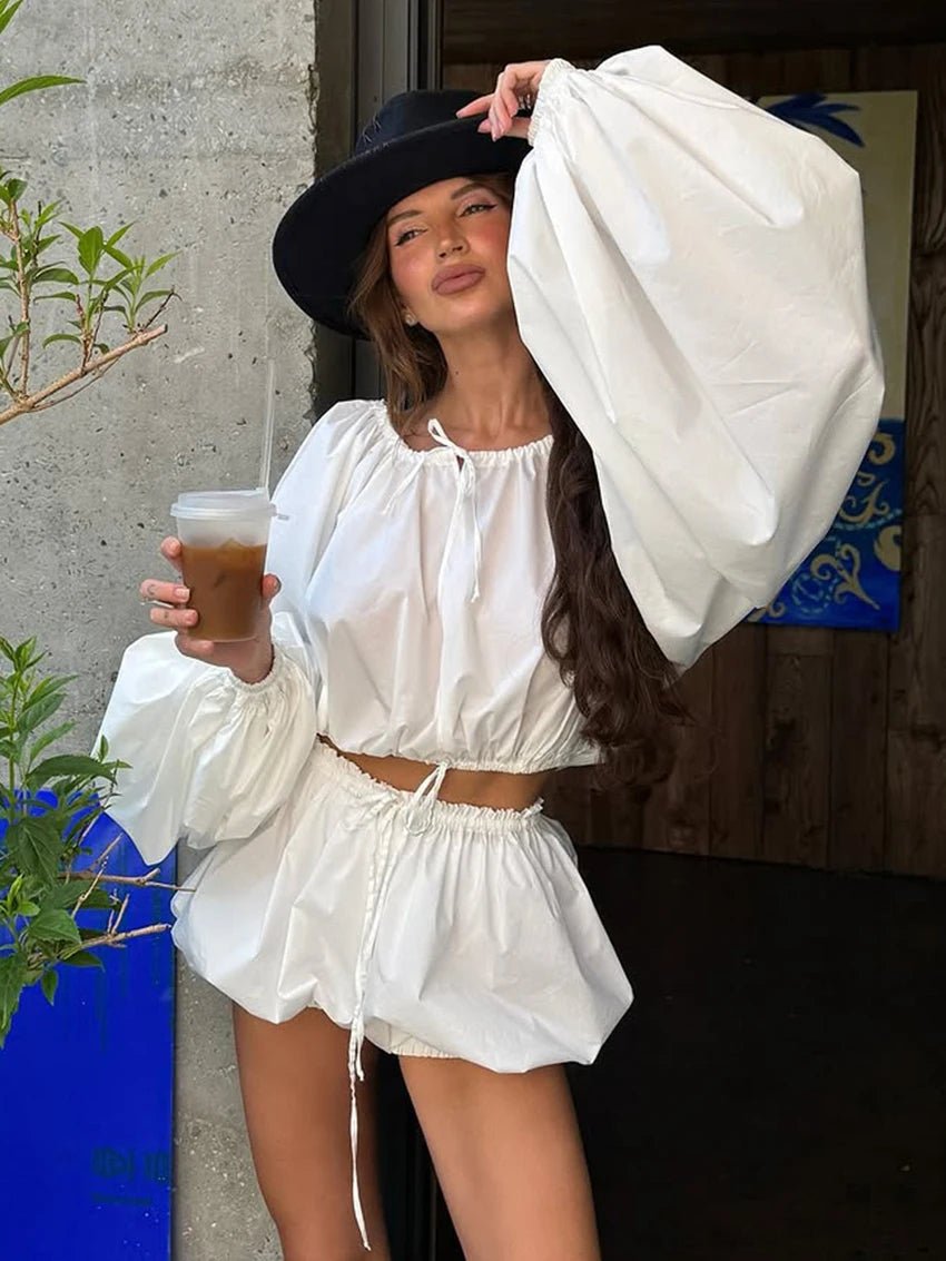 Conjunto de blusa de hombros descubiertos y shorts Zoe