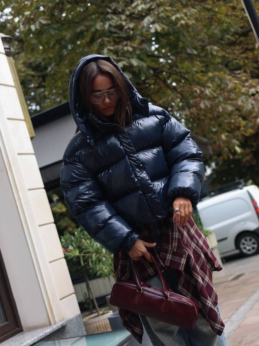 Mette Glossy Hooded Puffer Jacket in navy – styled look