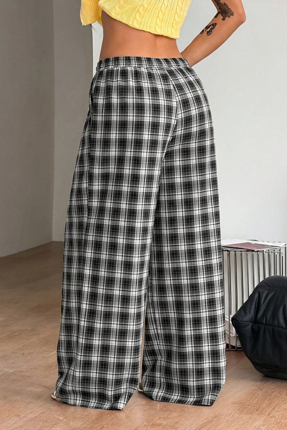 Saga Plaid Drawstring Wide-Leg Pants in black plaid – styled look